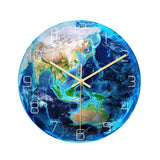 Horloge planète Terre phosphorescente Asie