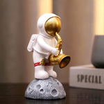 Figurine astronaute saxophoniste