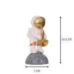 Taille figurine astronaute saxophoniste
